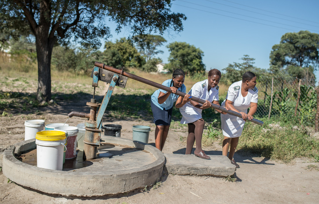 Nurses pumping water